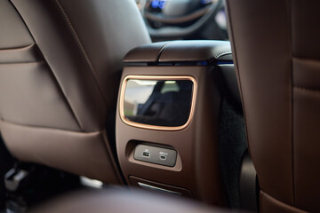 Multimedia screen for rear passenger seats
