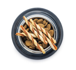 Dog food. Snack sticks for dogs isolated on white background.