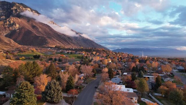 Drone Over Provo Utah Neighborhoods in Autumn at Sunset with Beautiful Colors