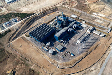 Fototapeta premium Aerial view of cement factory with high concrete plant structure