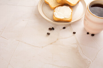 Toast with cream cheese in a marbled background in aerial view mockup