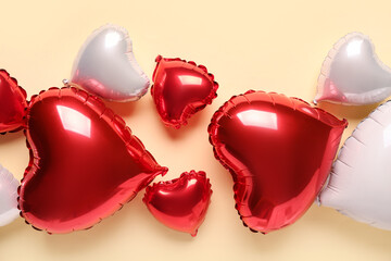 Heart shaped air balloons on yellow background. Valentine's Day celebration