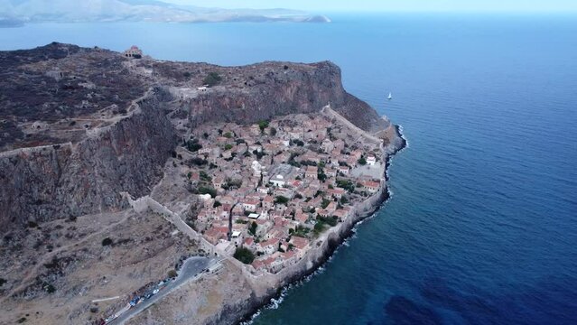Aerial 4k Monemvasia Old Town in Peloponnese, Greece. This video is about the monemvasia island, the old village in Peloponnese, Greece, made with a drone during the summer in a sunny conditions