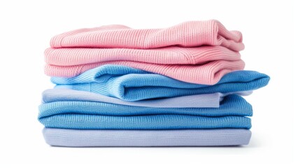 Soft, neatly folded sweaters lay stacked atop one another like a stack of towels, creating a sense of warmth and coziness in the room