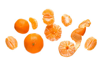 Flying sweet ripe mandarins on white background