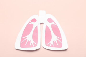 Paper lungs on beige background