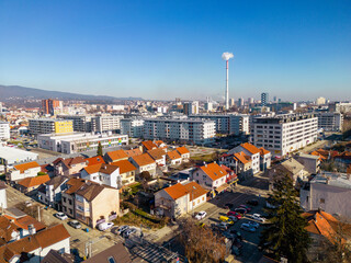 Aerial image of Zagreb city suburbs with small, old houses and new, planned parts with parks and apartment blocks