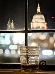 Looking at St Paul's cathedral through the window of a pub
