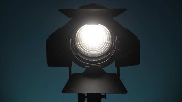 Studio light with fresnel lens and barndoors. Close-up, shallow dof.