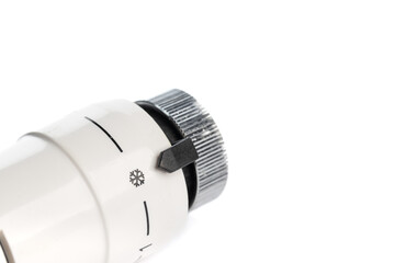 White head for a thermostatic valve isolated on a white background, close -up. (selective focus)
