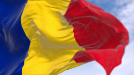Romania national flag waving in the wind on a clear day