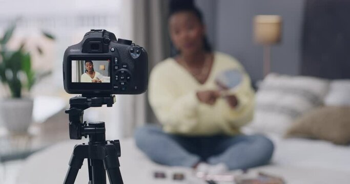Blog, woman and influencer with cosmetics in home for product review, vlogger and beauty routine in bedroom. Skincare, black person and live streaming with instructions, discussion or makeup tutorial