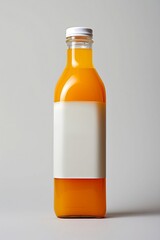 A Glass Bottle of Cider or Apple Juice with a Blank White Label and White Cap on a White Background