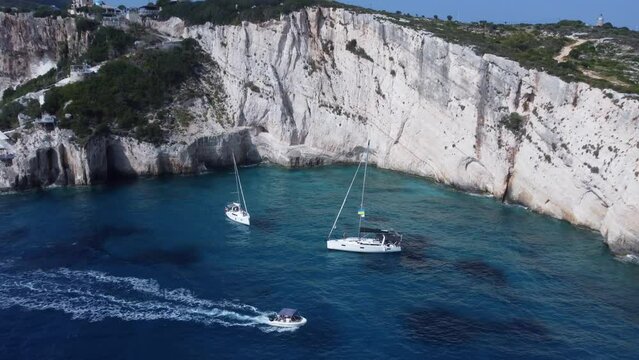 Aerial footage of Zakynthos Navagio and sailboats 4k