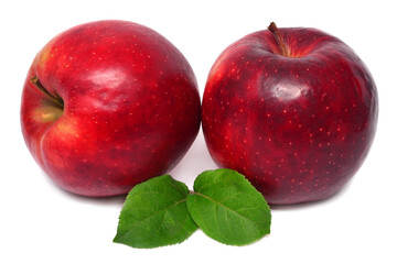 Two red apples with leaves isolated on white background