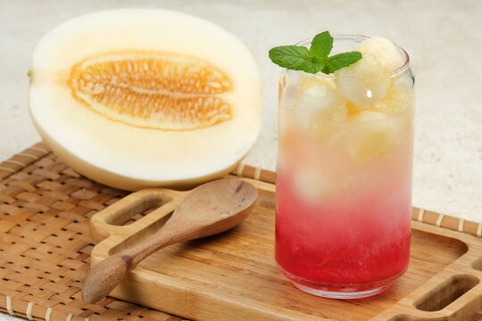 Es Timun Suri is an Indonesia cold fruity drink with red coco pandanus syrup.	