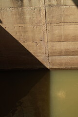 The walls of the reservoir with light and shadow