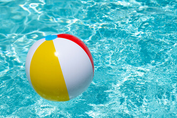 Summer vacation. Beach ball. Summer party. Inflatable beach ball. Striped ball for play in water....