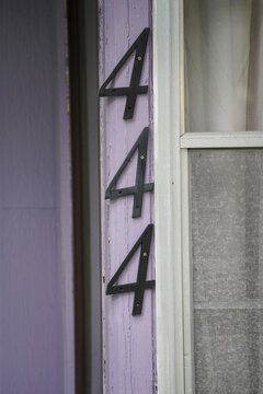 Number 444 on purple wall