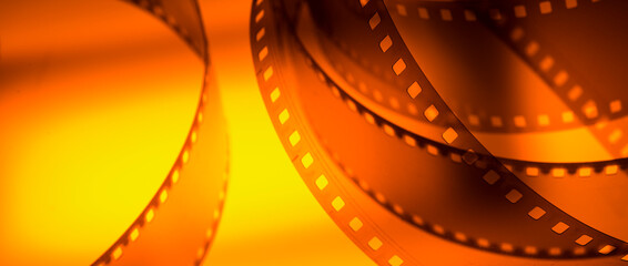 color background with film strip. film festivals, film production announcements of series and films...