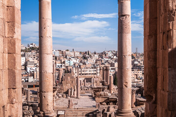 Jerash, Jordan November 9 2022: The largest roman city remaining overlooks the new modern town with...