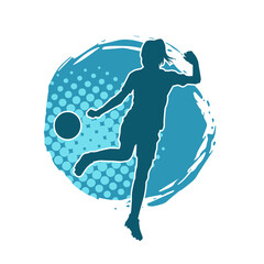 Silhouette of a female soccer player kicking a ball. Silhouette of a football player woman in action pose.
