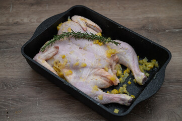 chicken tabaka marinated before cooking in the kitchen 5
