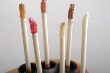 lipstick, beauty, cosmetics, fashion, red, makeup, glamour, make-up, cosmetic, color, lips, object, isolated, care, pink, accessory, tube, lip, stick, closeup, shiny, face, woman, gold, black