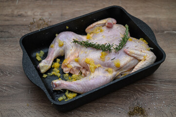 chicken tabaka marinated before cooking in the kitchen 13