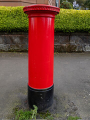 Fototapeta na wymiar red post box in Glasgow, Scotland