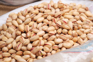 detail shot of pistachios nut on in bowl 