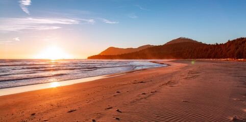 Sandy Beach on Pacific Ocean West Coast during Sunny Sunset. Vancouver Island