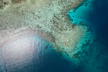 Aerial view above tropical coral reef on Island in Fiji in the Pacific Ocean