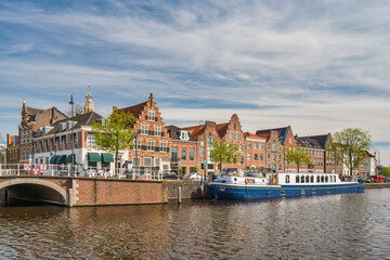 Haarlem Netherlands, city skyline at canal waterfront