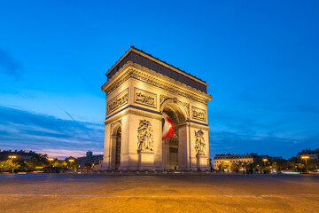 Paris France, city skyline night at Arc de Triomphe and Champs Elysees