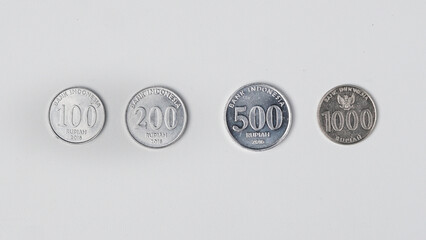 variants of 100, 200, 500 and 1,000 Indonesian rupiah coins