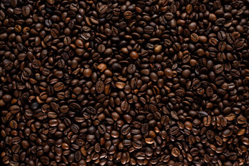 Coffee beans background, a closeup of coffee beans