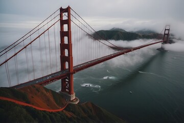 Aerial drone shots of the Golden Gate Bridge enveloped in fog, San Francisco, USA. 