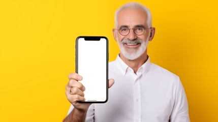 Smiling senior man presenting a smartphone with transparent display, isolated on a vibrant yellow background, ideal for digital technology concepts. AI Generative