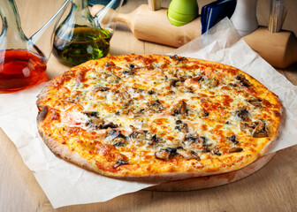 Pizza with mushrooms, cheese and tomato, lunch