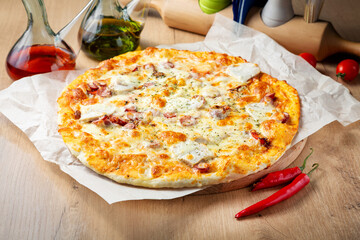 Pizza with sausages, sausage, cheese, tomato, lunch