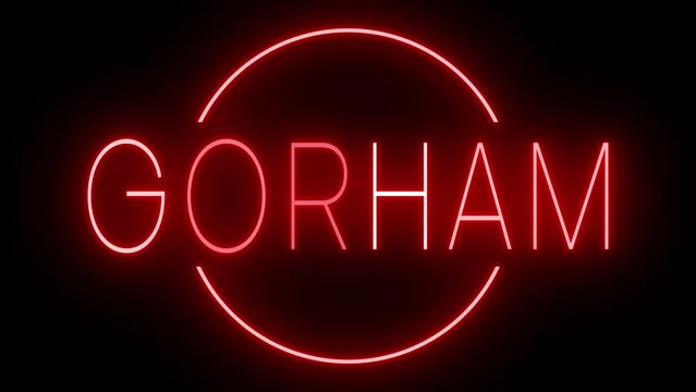 Flickering red retro style neon sign glowing against a black background for GORHAM