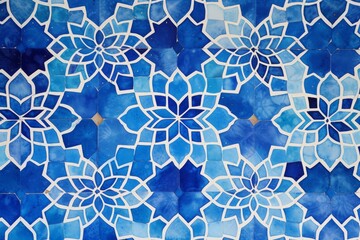 Fototapeta premium pattern of blue tiles with a white geometric floral design