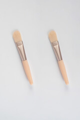 Cosmetic brushes on white background. Set of makeup brushes