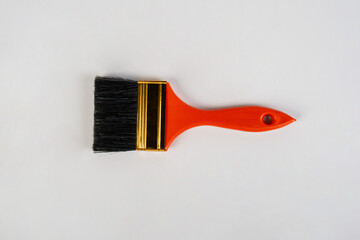 Clean new paint brush isolated on white background.