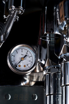 Fragment of the brewing group of an espresso coffee machine with a PID controller and pressure gauge