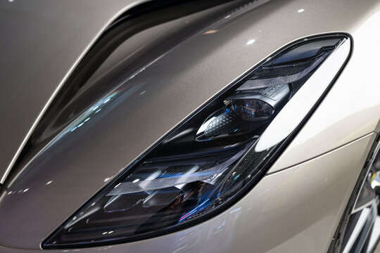 Headlight of Lotus emira on display at the Showroom. new Lotus Emira sports car.