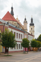 Fototapeta na wymiar View of the Franciscan Church from the pedestrian street in Pinsk, Belarus.
