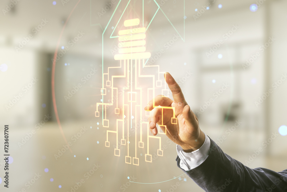 Poster male hand working with virtual creative light bulb with chip hologram on blurred office background, 