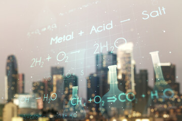 Double exposure of abstract virtual chemistry hologram on blurry cityscape background, research and development concept